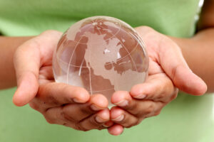 Glass globe in woman hands