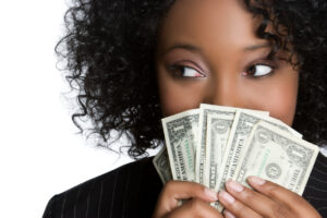 Woman Hiding Behind Money