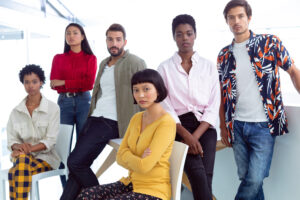 Business people looking at camera in a modern office