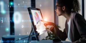 Black woman working in the office and digital technology concept.